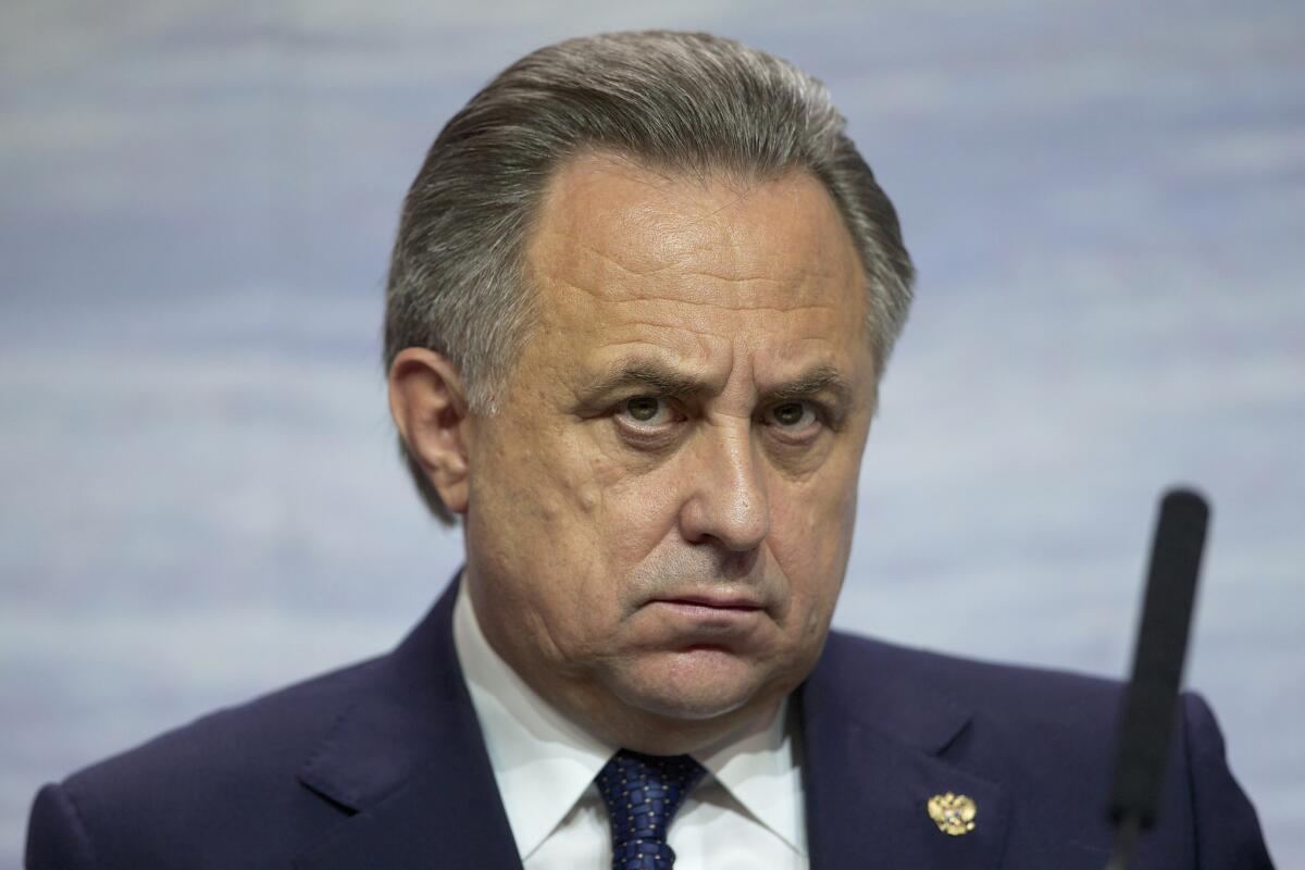 Russian Sports Minister Vitaly Mutko listens during a presentation about ice hockey on Oct. 30, 2015.