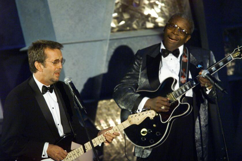 Eric Clapton and B.B. King perform at the Grammy Awards in 1999.