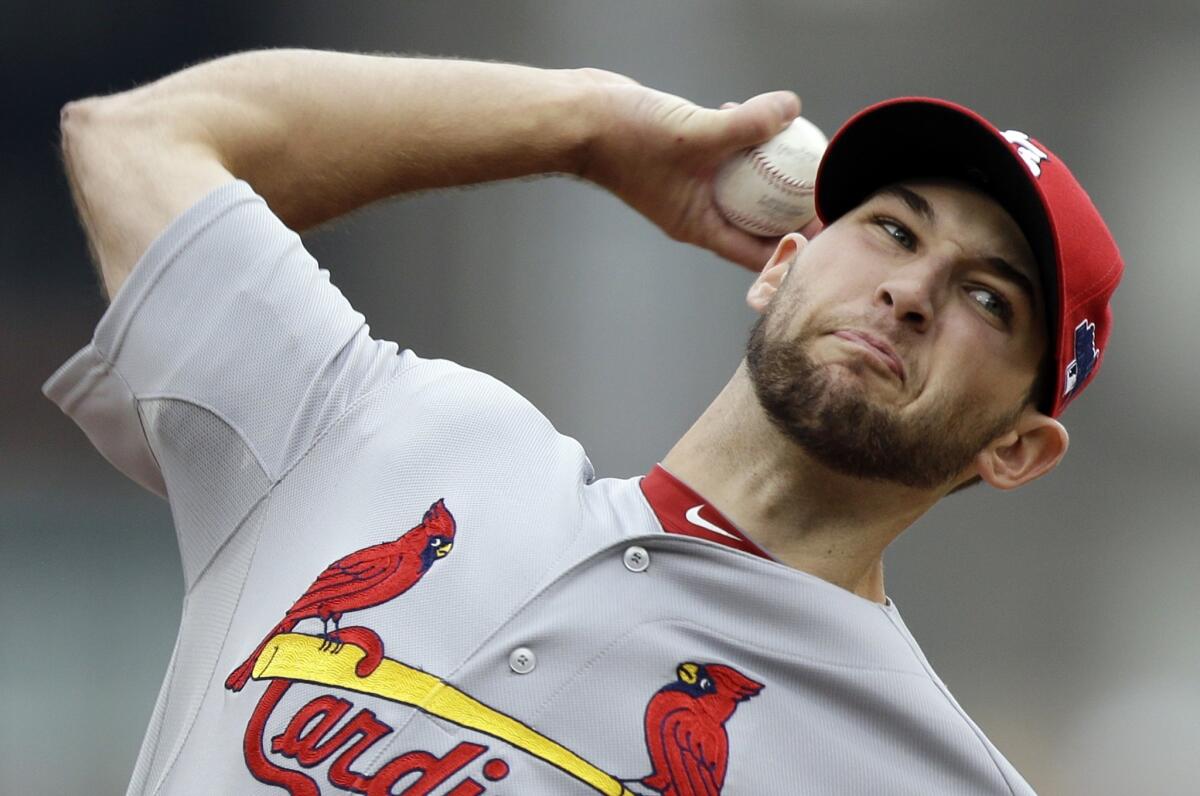 St. Louis starter Michael Wacha delivers a pitch during the second inning of the Cardinals' 2-1 victory over the Pittsburgh Pirates in Game 4 of the National League division series Monday.