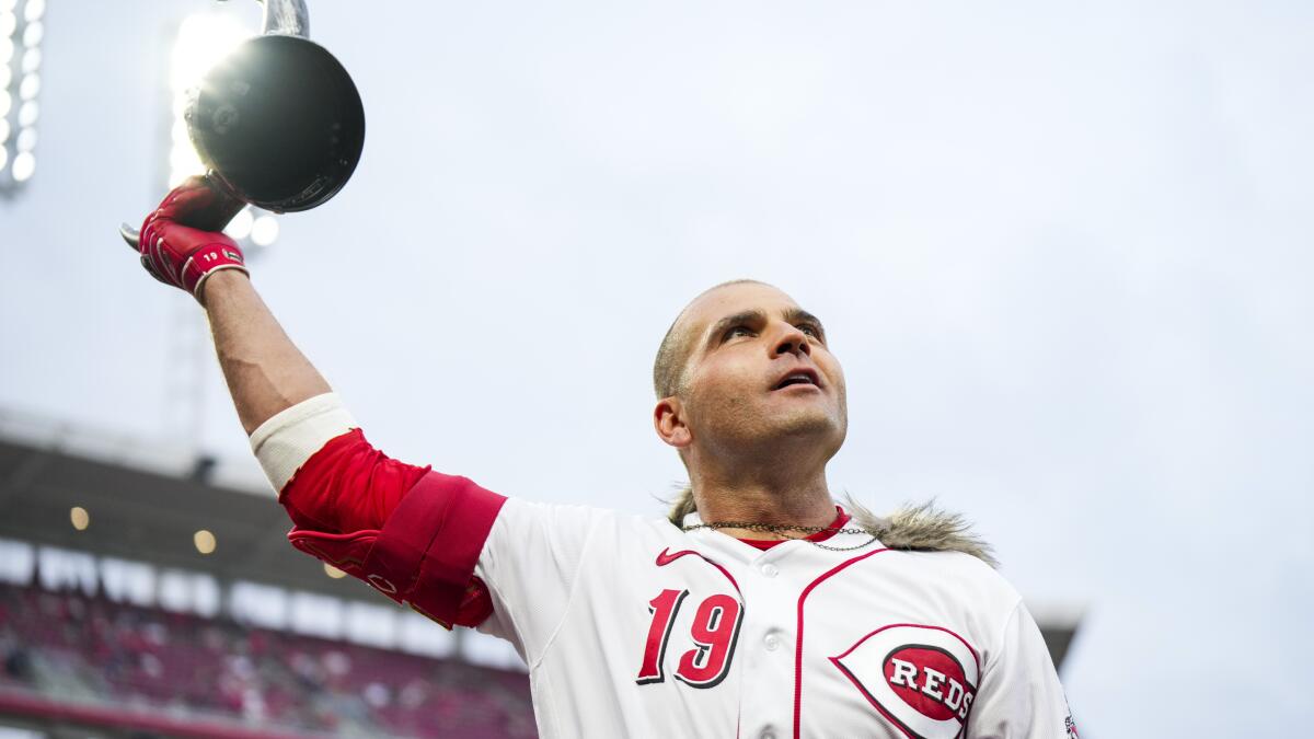 Why Joey Votto wore a high school football jersey in press conference