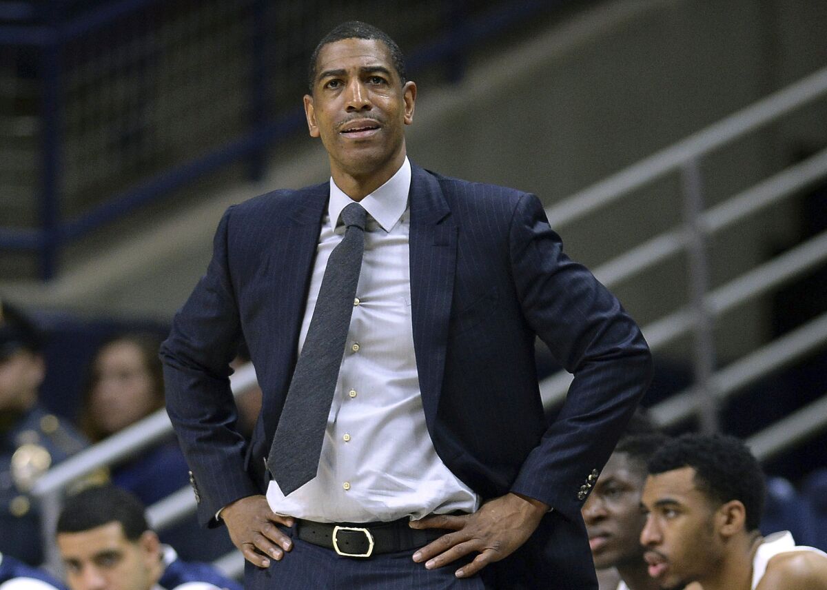Coach Kevin Ollie reacts to a play during a game