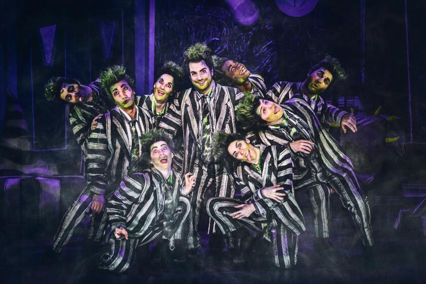 Justin Collette (center) and the company of "Beetlejuice."