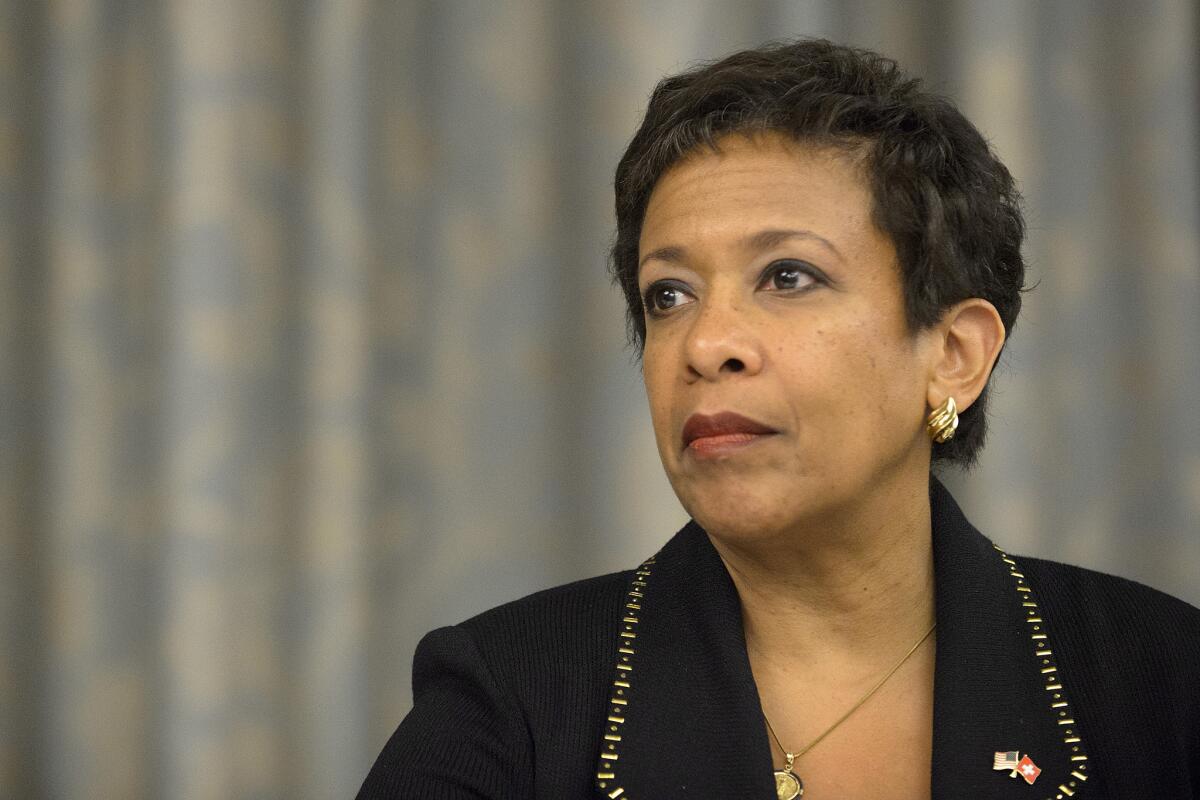 Atty. Gen. Loretta Lynch once opposed releasing Francois Holloway, a convicted car-jacker, from prison. She later withdraw that opposition, part of a trend of freeing nonviolent prisoners with unblemished records.