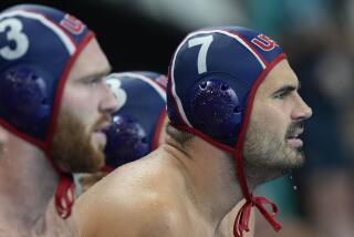 United States' Ben Hallock watches during a men's semifinal match between Serbia.