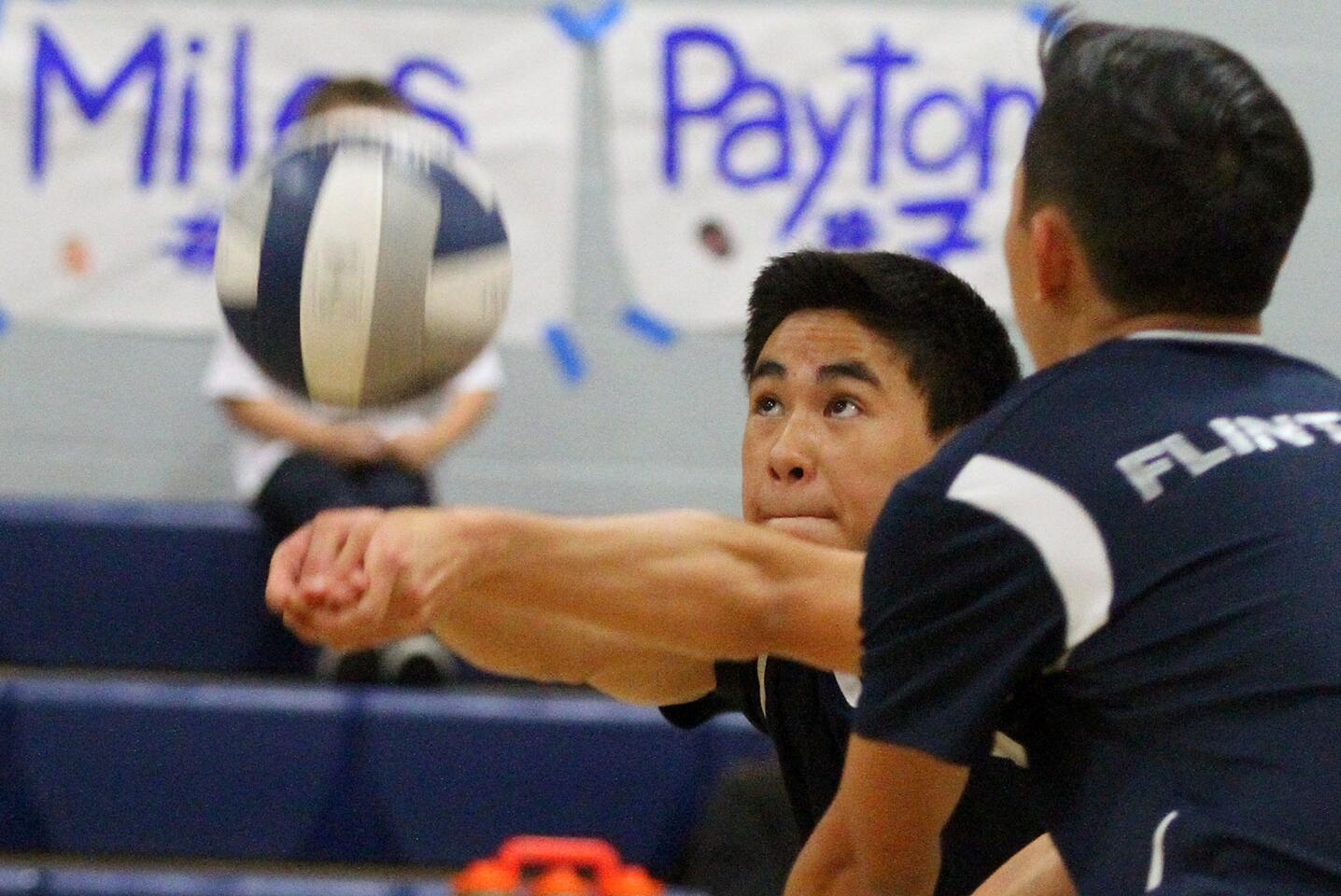 Flintridge Prep's Aldridge Khin hits the ball into play off the serve against Nuview Bridge in a first-round CIF playoff boys volleyball match at Flintridge Prep School in La Canada Flintridge on Tuesday, May 13, 2014.