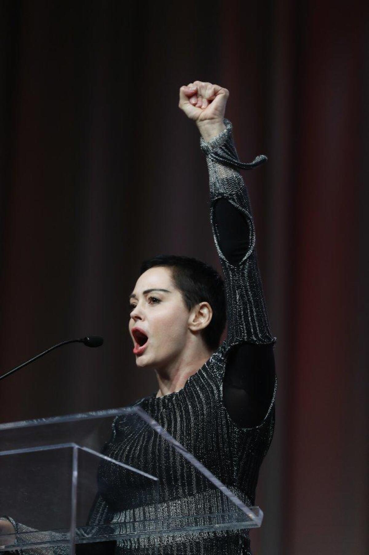 Rose McGowan speaks at the Women's Convention in Detroit on Friday.