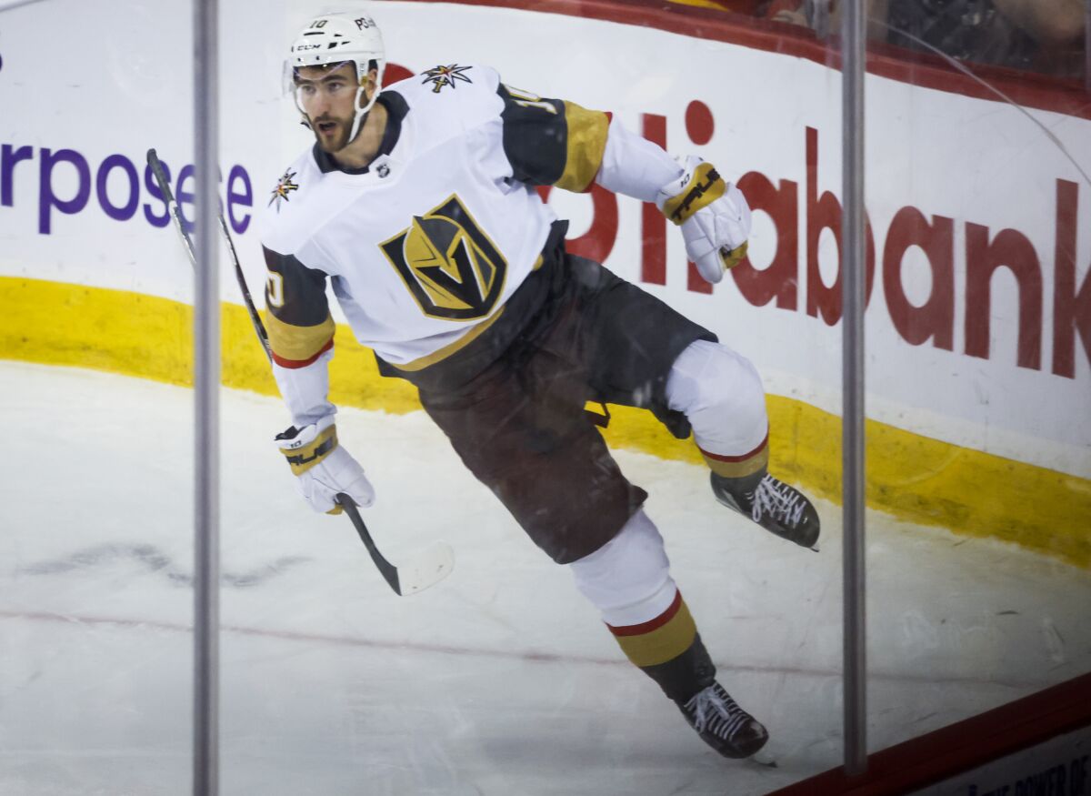 Vegas Golden Knights forward Nicolas Roy celebrates after his goal during third-period NHL hockey game action against the Calgary Flames in Calgary, Albera, Thursday, March 23, 2023. (Jeff McIntosh/The Canadian Press via AP)