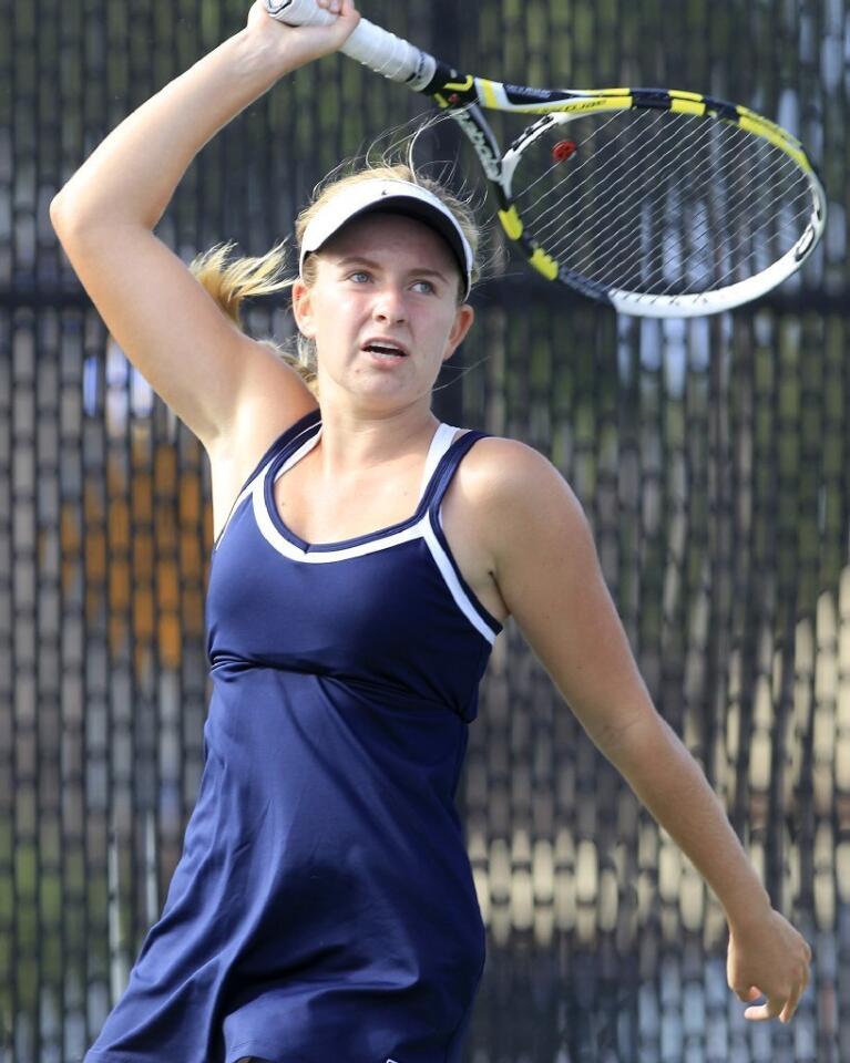 Newport Harbor High's Kate Knight plays in a singles set against Corona del Mar during the Battle of the Bay match on Tuesday.