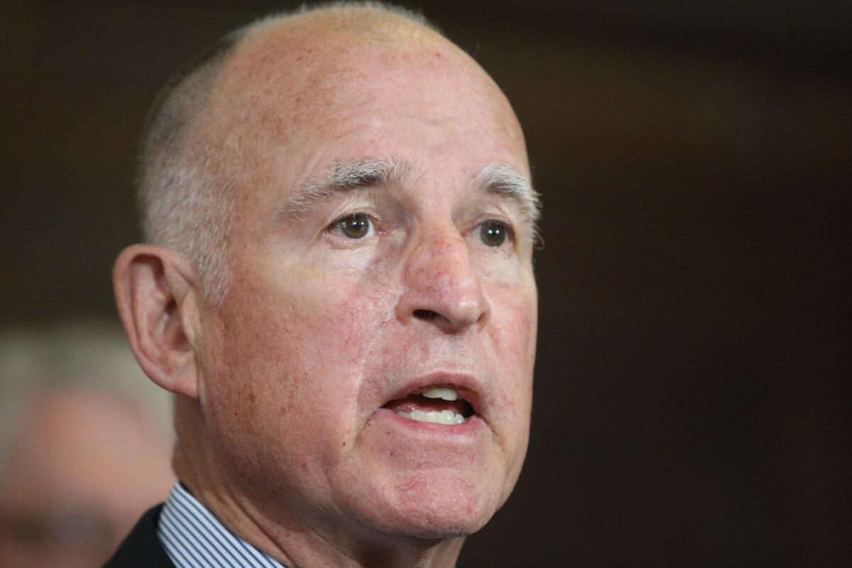 A Field Poll released Wednesday shows California Gov. Jerry Brown has the highest approval rating of his current term. Above, Brown speaks to reporters in February at Los Angeles City Hall.