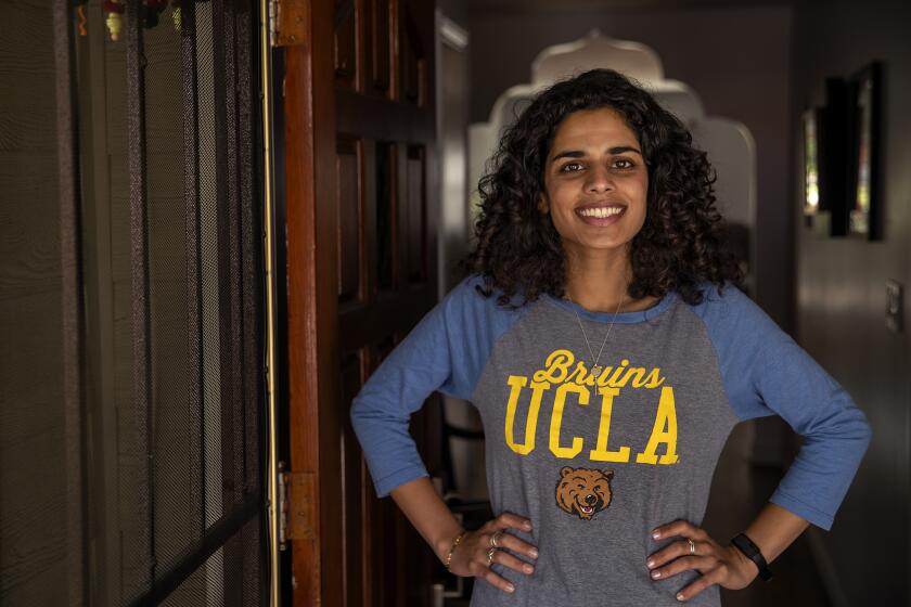 BURBANK, CA-MAY 23, 2022: Meera Varma, 23, a senior at UCLA, is photographed at her home in Burbank. Varma has struggled with her mental health for years and has taken her experiences to inspire her activism. Colleges are falling short to support students' mental health needs, and Meera experienced that first hand. (Mel Melcon / Los Angeles Times)