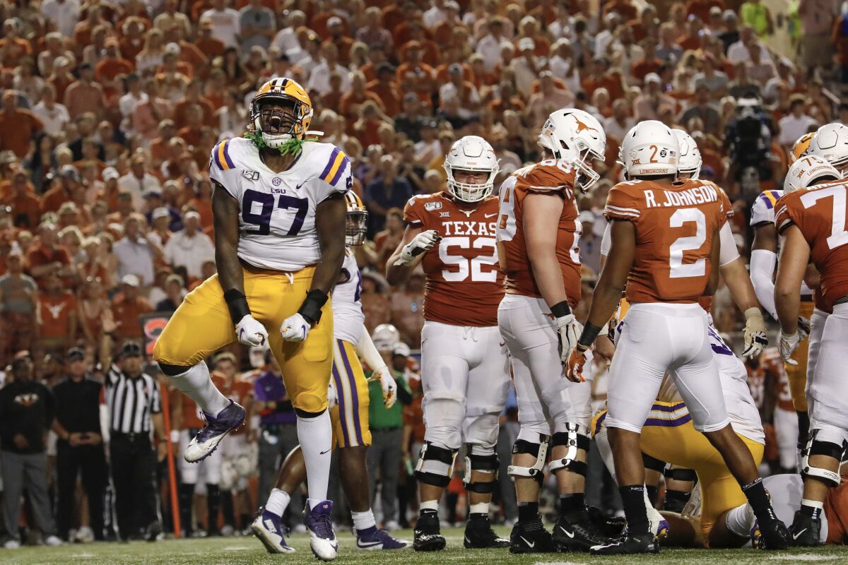 LSU's Glen Logan celebrates after a sack in the fourth quarter against Texas on Saturday in Austin, Texas.