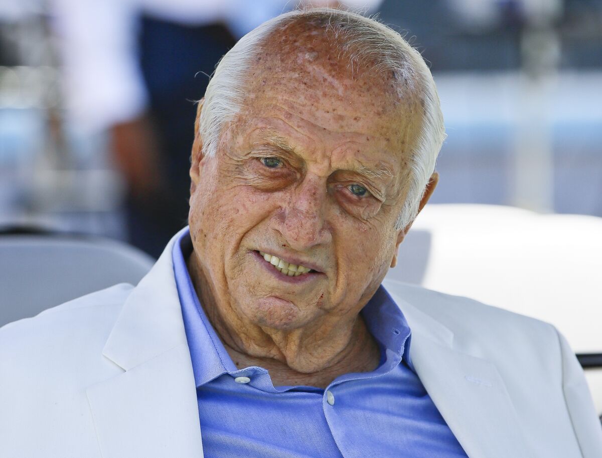 FILE - Los Angeles Dodgers former manager and Hall of Famer Tommy Lasorda attends a news conference where Baseball Commissioner Rob Manfred announced that Dodger Stadium will host the All-Star Game in 2020, in Los Angeles, in this Wednesday, April 11, 2018, file photo. The Dodgers said Sunday, Nov. 15, 2020, that their 93-year-old former manager was in intensive care and resting comfortably at a hospital in Orange County, Calif. (AP Photo/Damian Dovarganes)