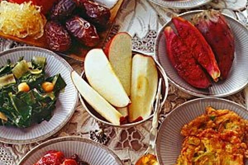 Leek fritters, lower right, are among the symbolic -- and delicious -- delights served on Rosh Hashanah.