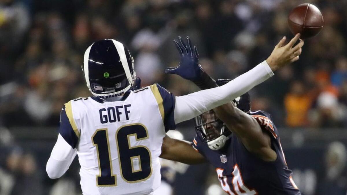 The Bears' Leonard Floyd  puts pressure on Rams quarterback Jared Goff  in the first quarter of their game in Chicago last December.