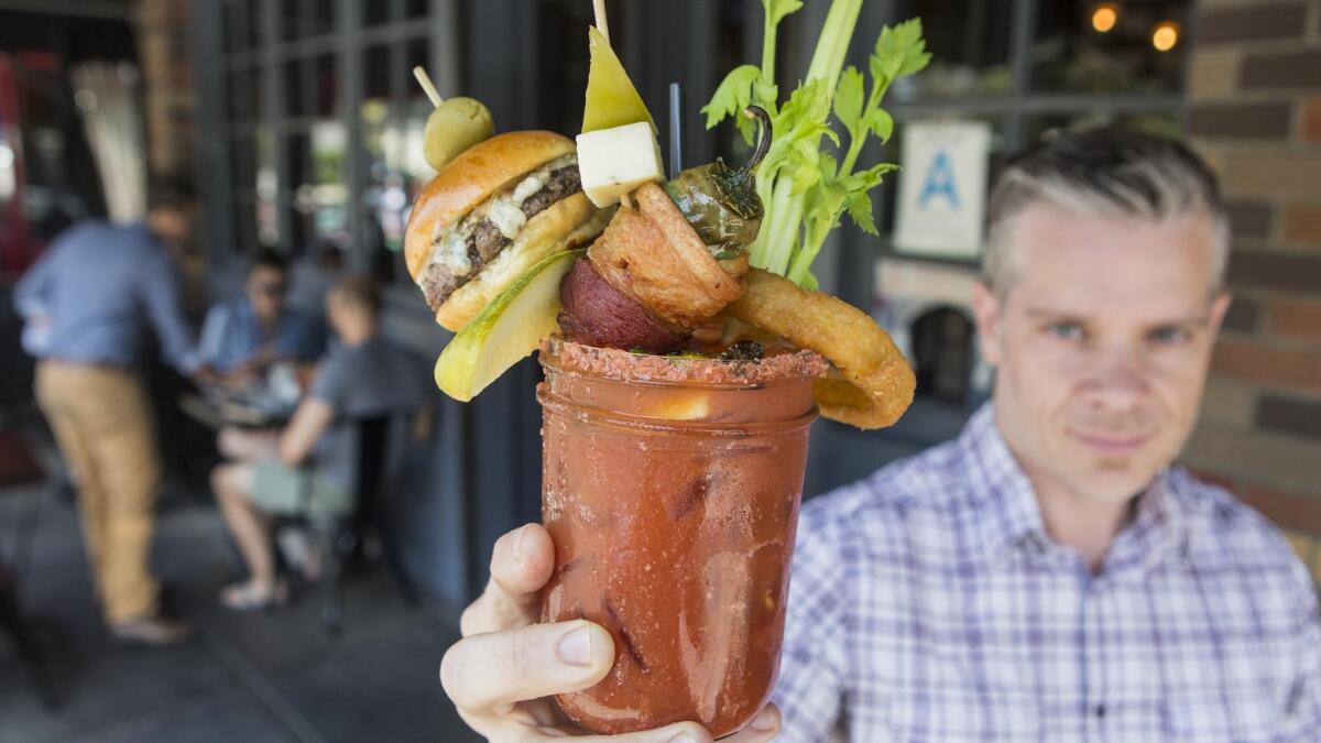 Bloody mary pitcher in Las Vegas is topped with a full meal