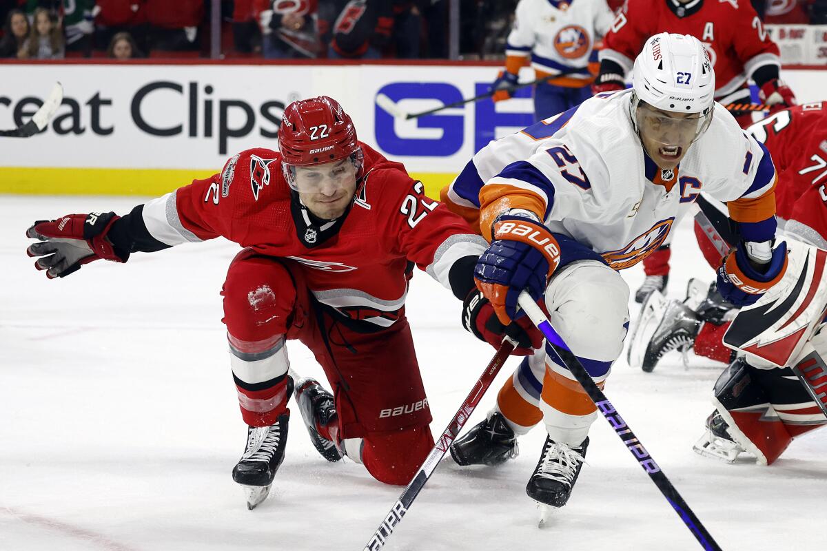 Hurricanes hold on to beat Islanders to open NHL playoffs - The