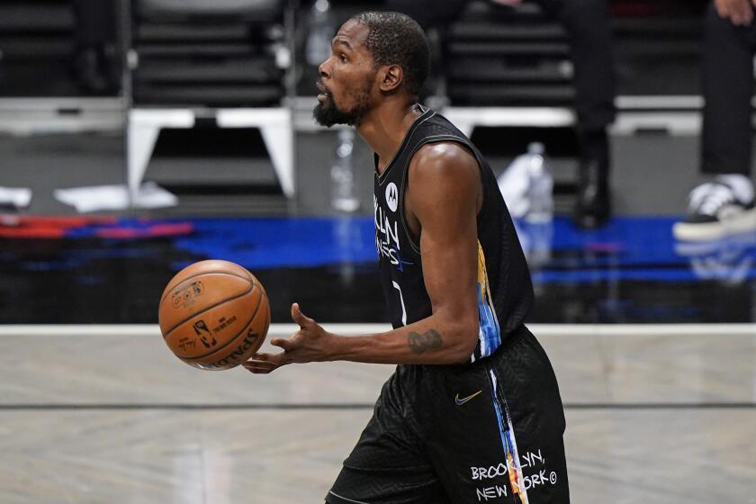 Brooklyn Nets forward Kevin Durant (7) drives the ball during the second quarter of an NBA basketball game against the Los Angeles Clippers, Tuesday, Feb. 2, 2021, in New York. (AP Photo/Kathy Willens)