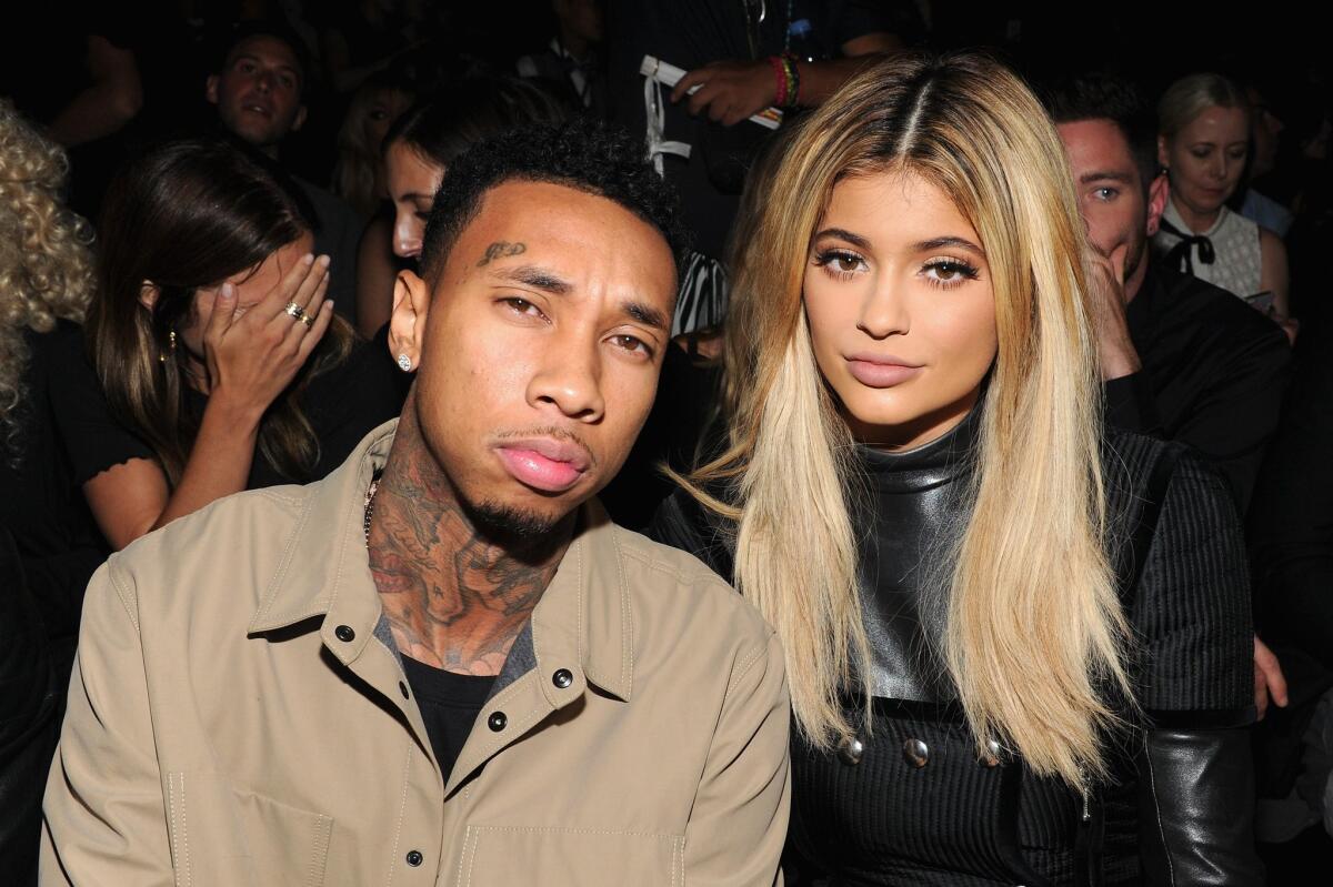 Rapper Tyga, left, and model Kylie Jenner attend the Alexander Wang Spring 2016 fashion show.