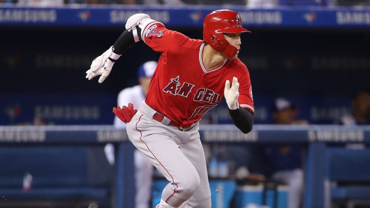 The Angels' Shohei Ohtani runs to first base during a game against the Toronto Blue Jays on June 17. Ohtani is a tourism magnet for the team and the city of Anaheim.
