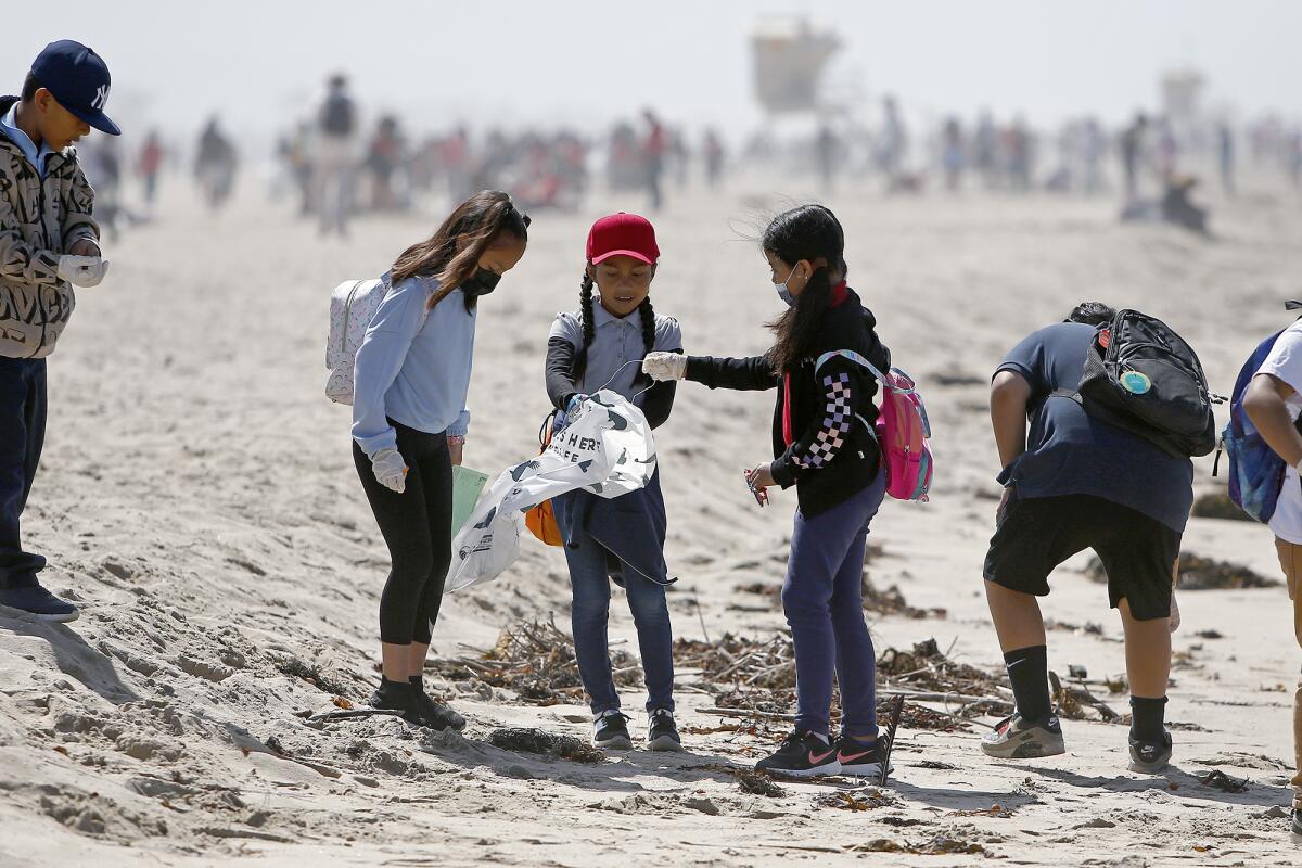 Third-graders from Handy Elementary School in Santa Ana participate in Kids Ocean Day at Huntington State Beach.