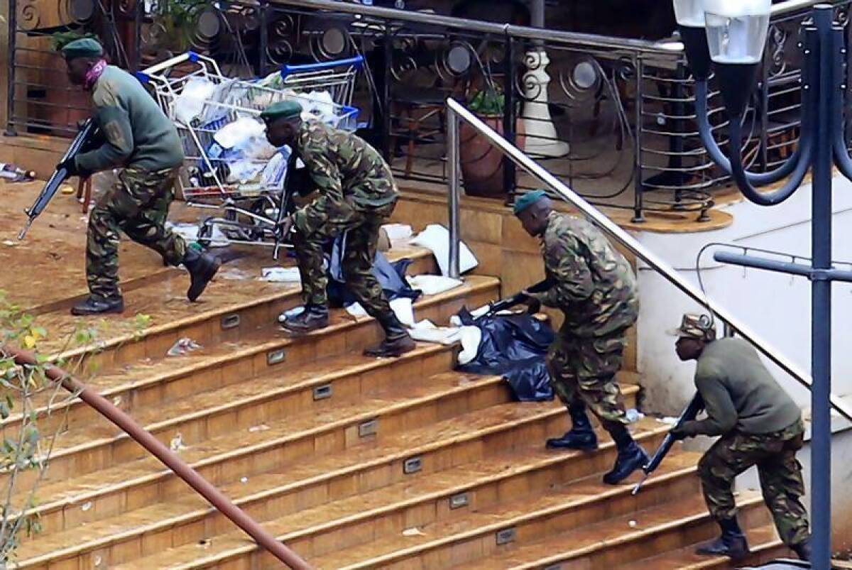 Kenya Defense Forces soldiers take their position at the Westgate shopping centre in Nairobi.