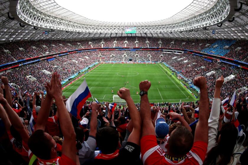 MOSCOW, RUSSIA - JUNE 14: Russian fans celebrate Iury Gazinsky opening goal the 2018 FIFA World Cup Russia Group A match between Russia and Saudi Arabia at Luzhniki Stadium on June 14, 2018 in Moscow, Russia. (Photo by Clive Rose/Getty Images) ** OUTS - ELSENT, FPG, CM - OUTS * NM, PH, VA if sourced by CT, LA or MoD **