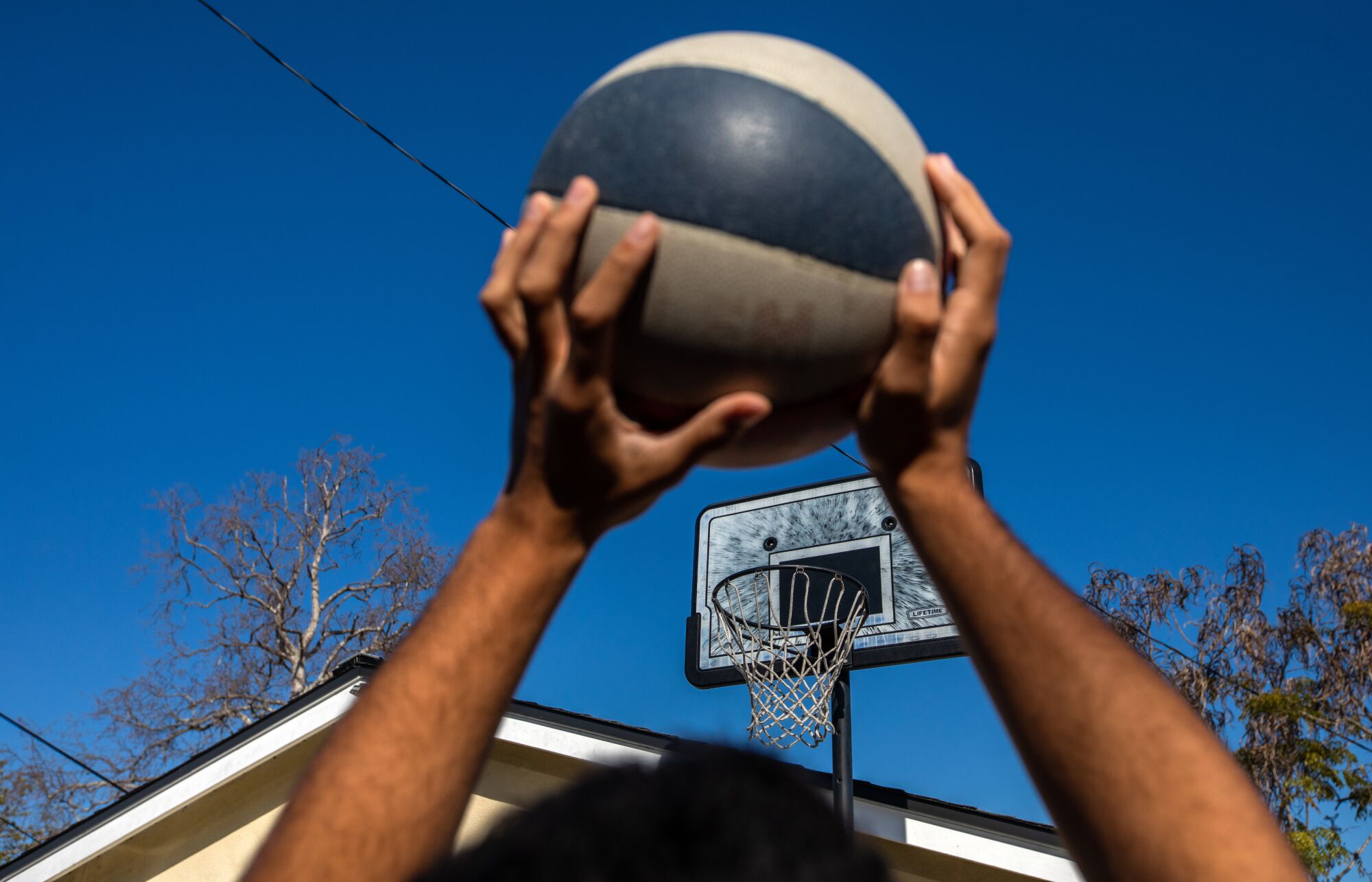 Kade West takes a shot at his home on Friday, March 3, 2023, in Long Beach