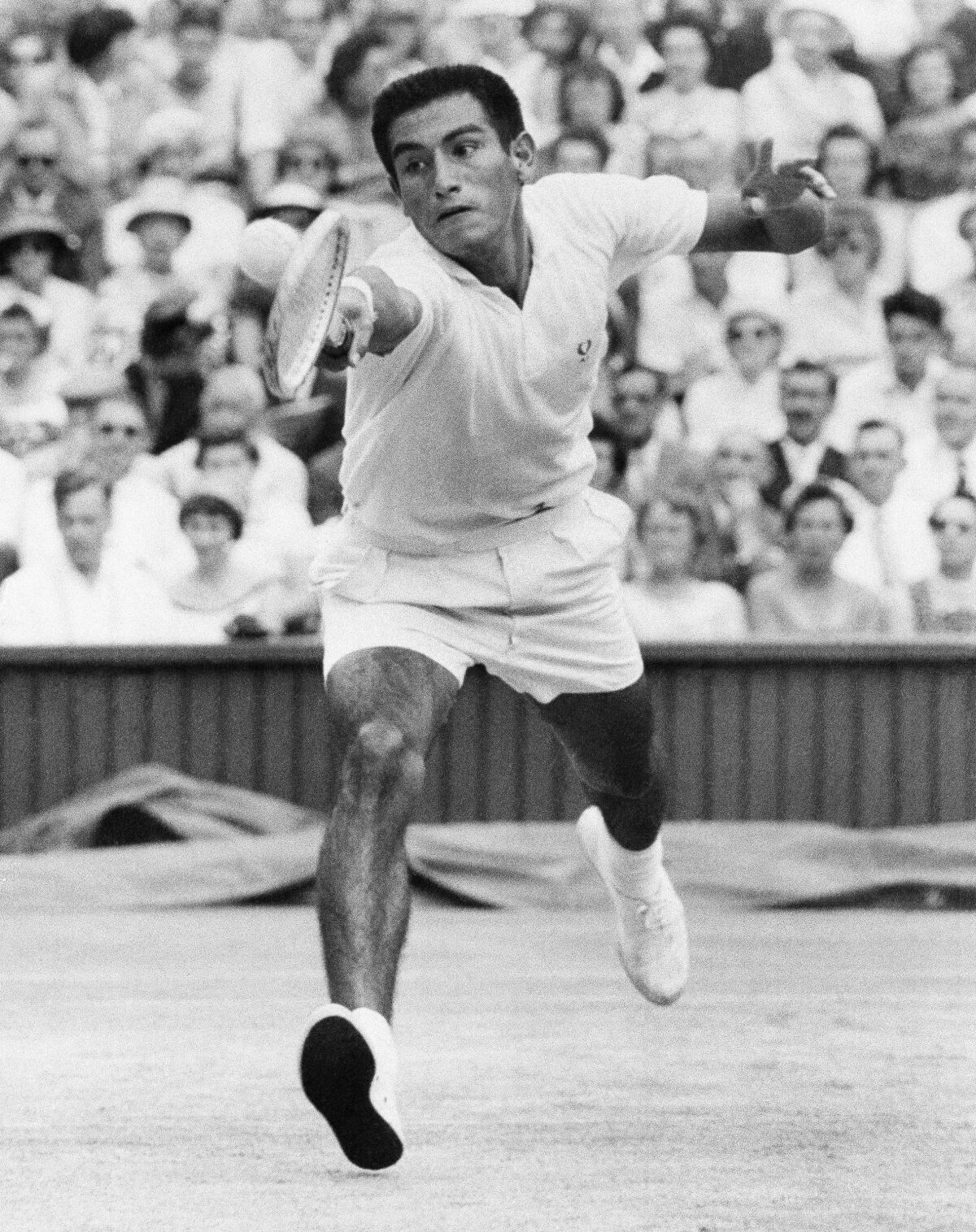 Alex Olmedo, pictured at Wimbledon in 1959, went on to teach tennis at the Beverly Hills Hotel.