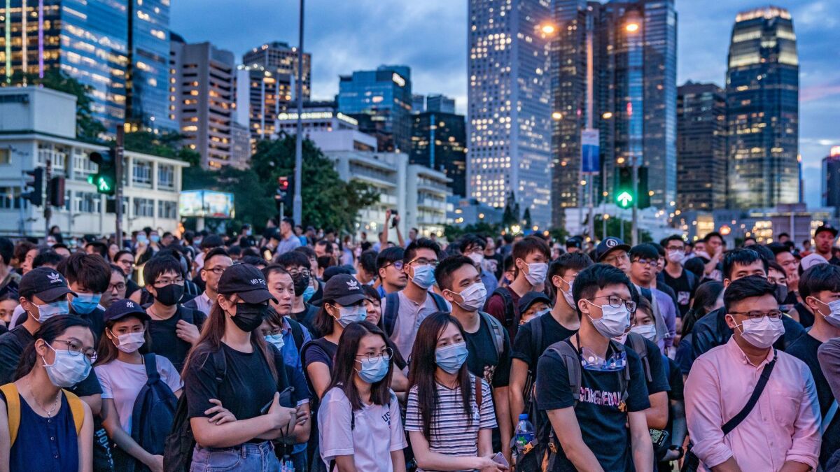 Protesters occupy a street June 17 in Hong Kong demanding that Chief Executive Carrie Lam step down.