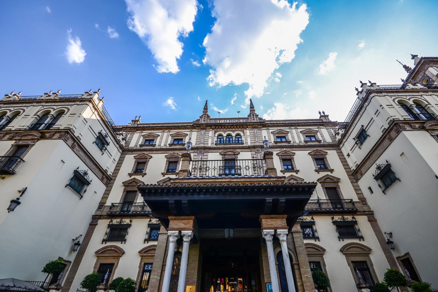 Facade of Alfonso XIII hotel in Seville, Spain