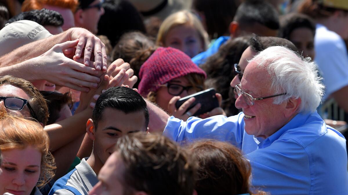 Democratic presidential candidate Sen. Bernie Sanders greets supporters after speaking at a rally in Santa Maria.