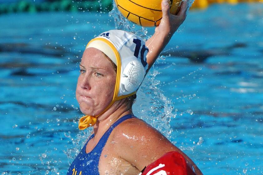 UCLA Bruins Kelly Rulon throws a ball on net during the 2007 Women's Water Polo Finals, UCLA vs Stanford. UCLA won their 100th NCAA Team Championship.