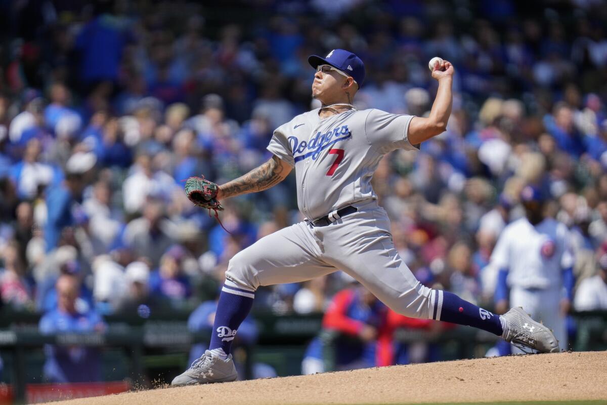 Dodgers starting pitcher Julio Urías throws during the first inning against the Cubs on Friday.