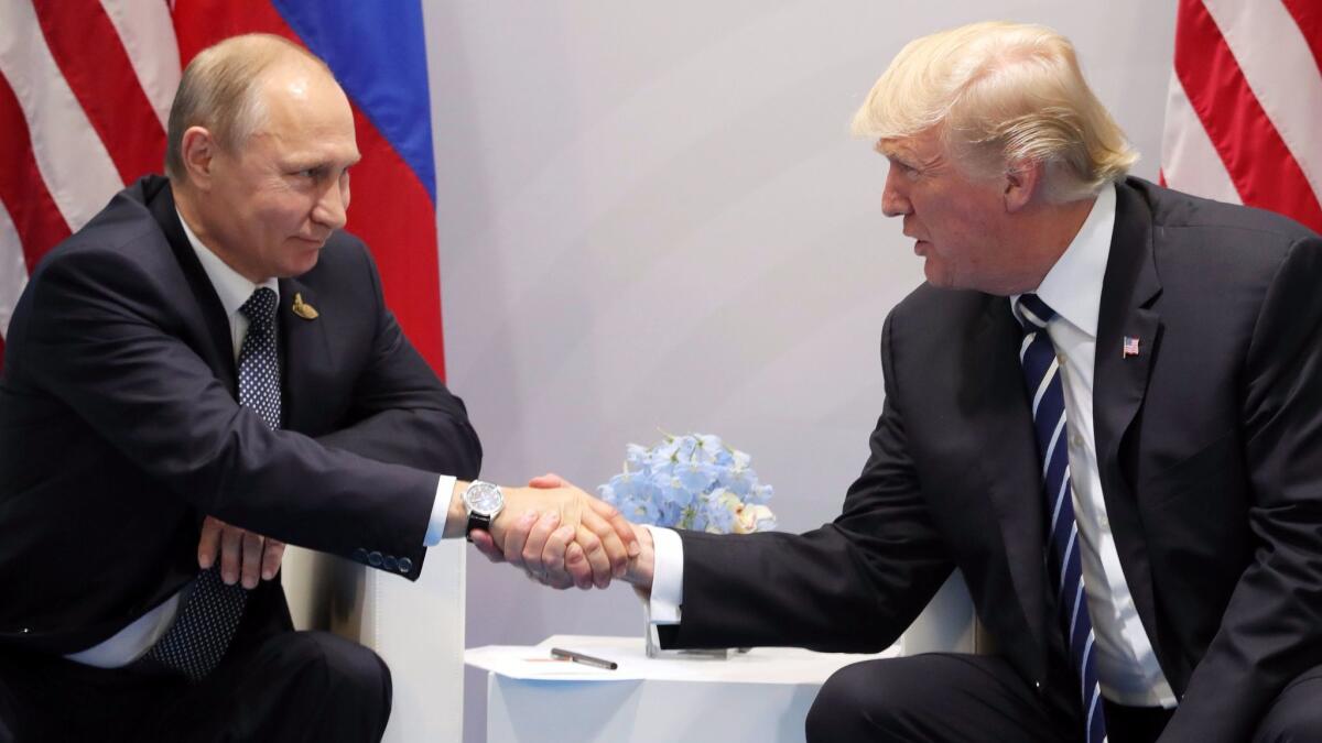 Russian President Vladimir Putin and Donald J. Trump shake hands during a meeting on the sidelines of the G20 summit in Hamburg, Germany on July 7.