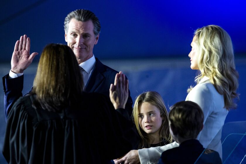 Gavin Newsom takes the oath of office, administered by California State Chief Justice Tani Gorre Cantil-Sakauye, and is sworn in as the 40th governor of California in front of the Capitol in Sacramento.