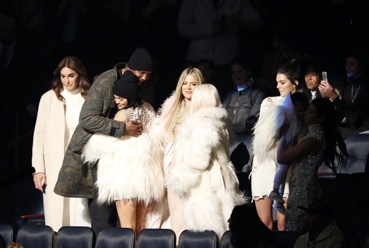 Caitlyn Jenner, left, Lamar Odom, Kylie Jenner, Khloe Kardashian Odom, Kim Kardashian, Kendall Jenner, North West and Kourtney Kardashian at the Yeezy Season 3 show.