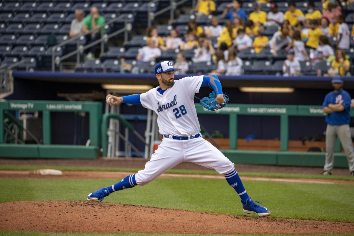 Israel pitcher Josh Zeid delivers during an exhibition game.