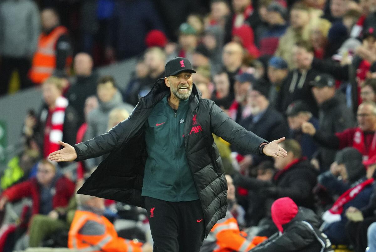 Liverpool's manager Jurgen Klopp reacts during the English Premier League soccer match between Liverpool and Manchester City at Anfield stadium in Liverpool, Sunday, Oct. 16, 2022. (AP Photo/Jon Super)
