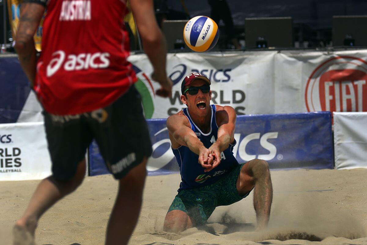 U.S. player Nick Lucena, shown on Thursday, and teammate Phil Dalhausser advanced to the finals of ASICS World Series of Beach Volleyball in Long Beach.