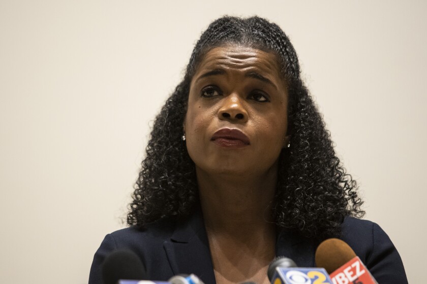 FILE - In this Aug. 10, 2020 file photo, Cook County State's Attorney Kim Foxx speaks during a news conference in Chicago. Foxx apologized Wednesday, May 5, 2021, for a suggestion by one of her attorneys that 13-year-old Adam Toledo was holding a gun the instant he was fatally shot by a Chicago police officer in March. She also acknowledged that neither she nor anyone in her office tried to clear up the matter until right before video was released showing that wasn't actually the case. (Ashlee Rezin Garcia/Chicago Sun-Times via AP, File)