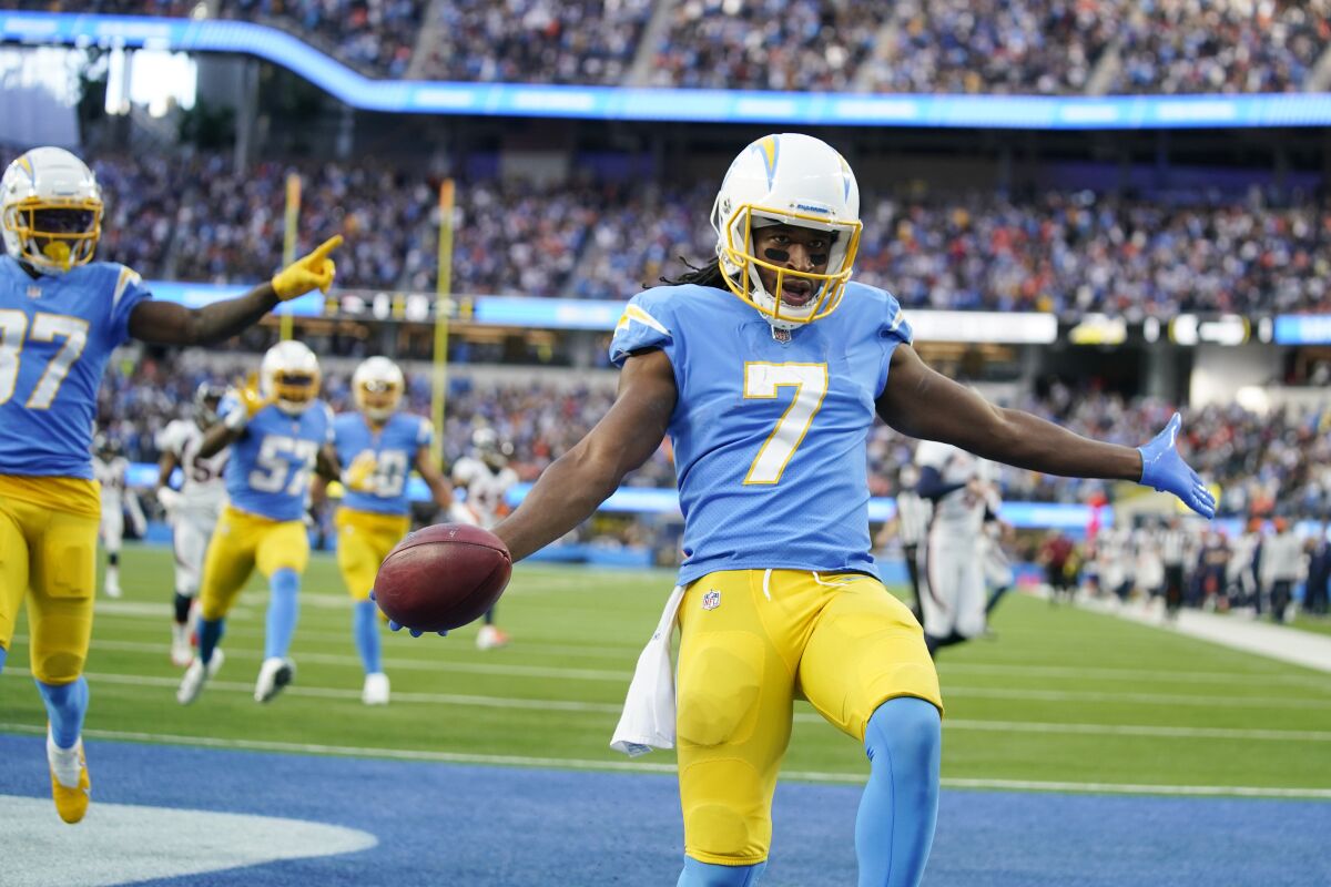 Los Angeles Chargers wide receiver Andre Roberts celebrates after returning a kick for a touchdown Sunday.