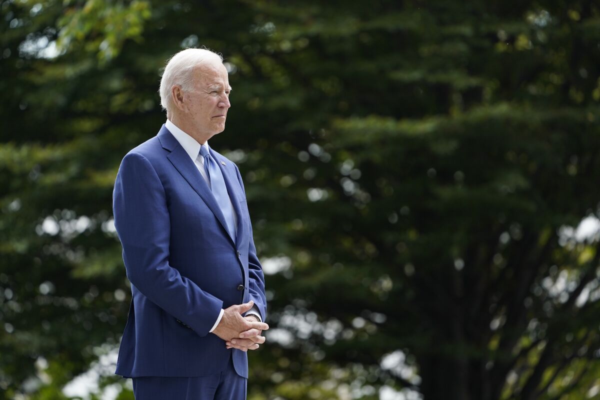 President Joe Biden waits to speak on the North Lawn of the White House in Washington, Friday, Oct. 8, 2021, during an event announcing that his administration is restoring protections for two sprawling national monuments in Utah that have been at the center of a long-running public lands dispute, and a separate marine conservation area in New England that recently has been used for commercial fishing. (AP Photo/Susan Walsh)