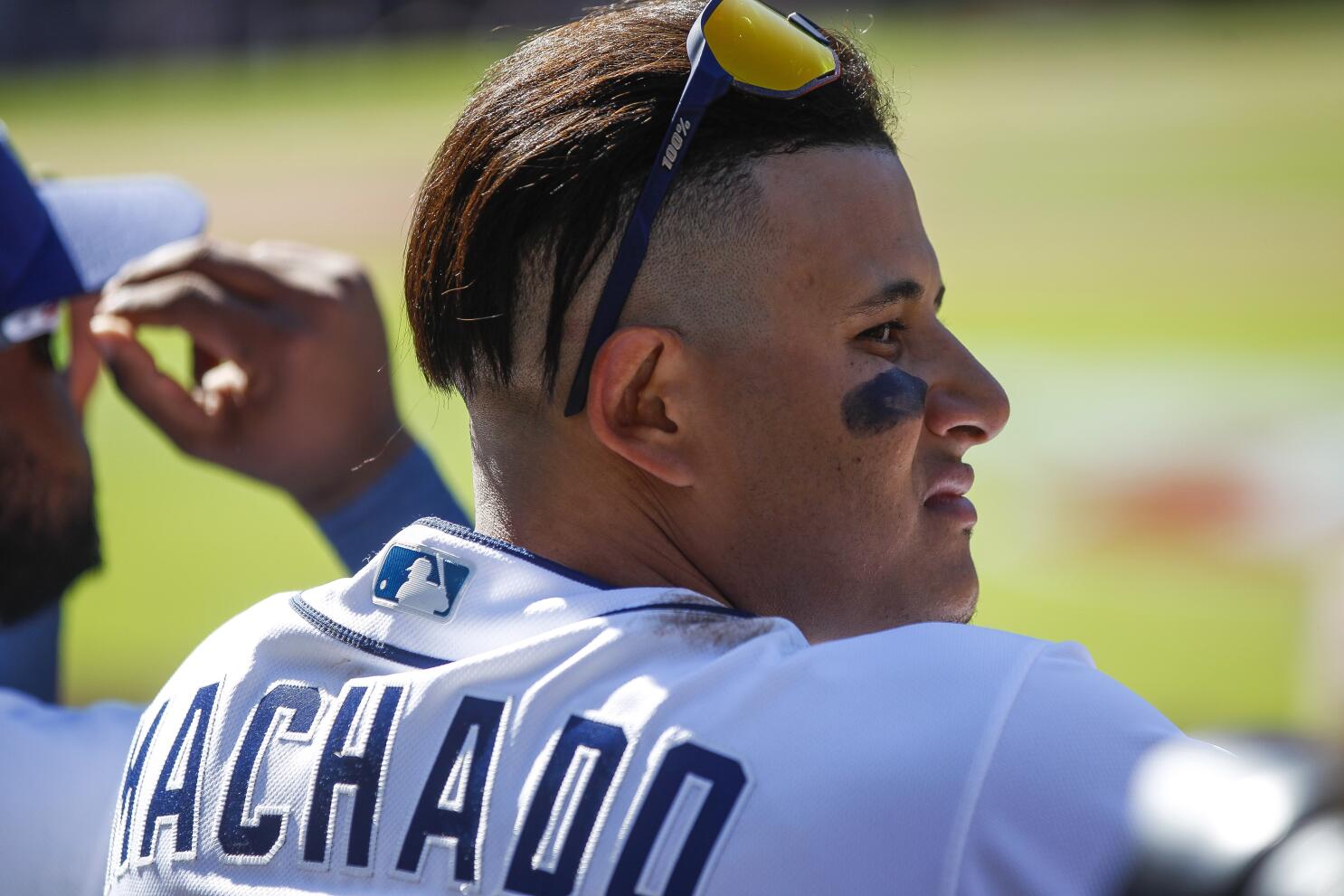San Diego Padres third baseman Manny Machado (13) wears custom