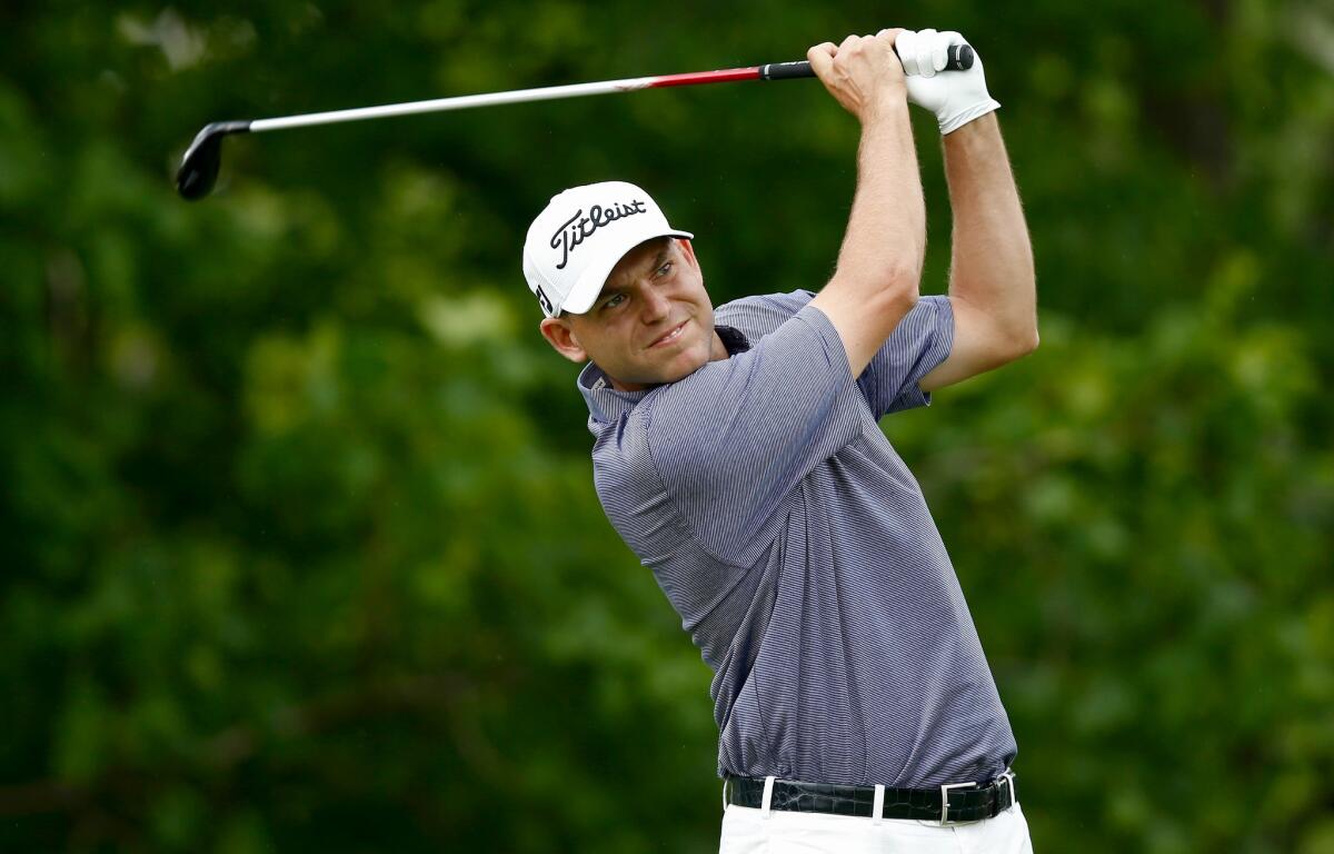 Bill Haas hits his tee shot on the 14th hole during the second round of the Memorial Tournament.