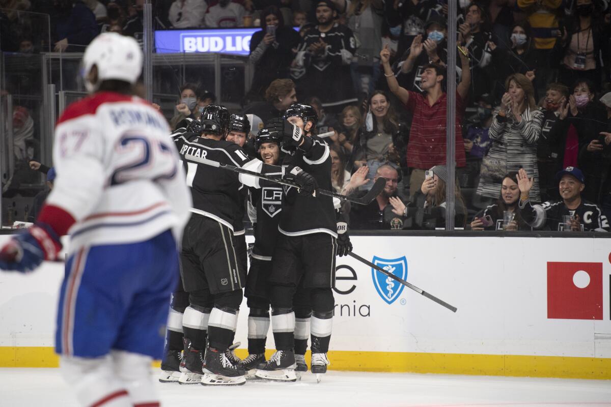 The Kings celebrate Arthur Kaliyev's second-period goal against the Montreal Canadiens on Oct. 30, 2021, at Staples Center.