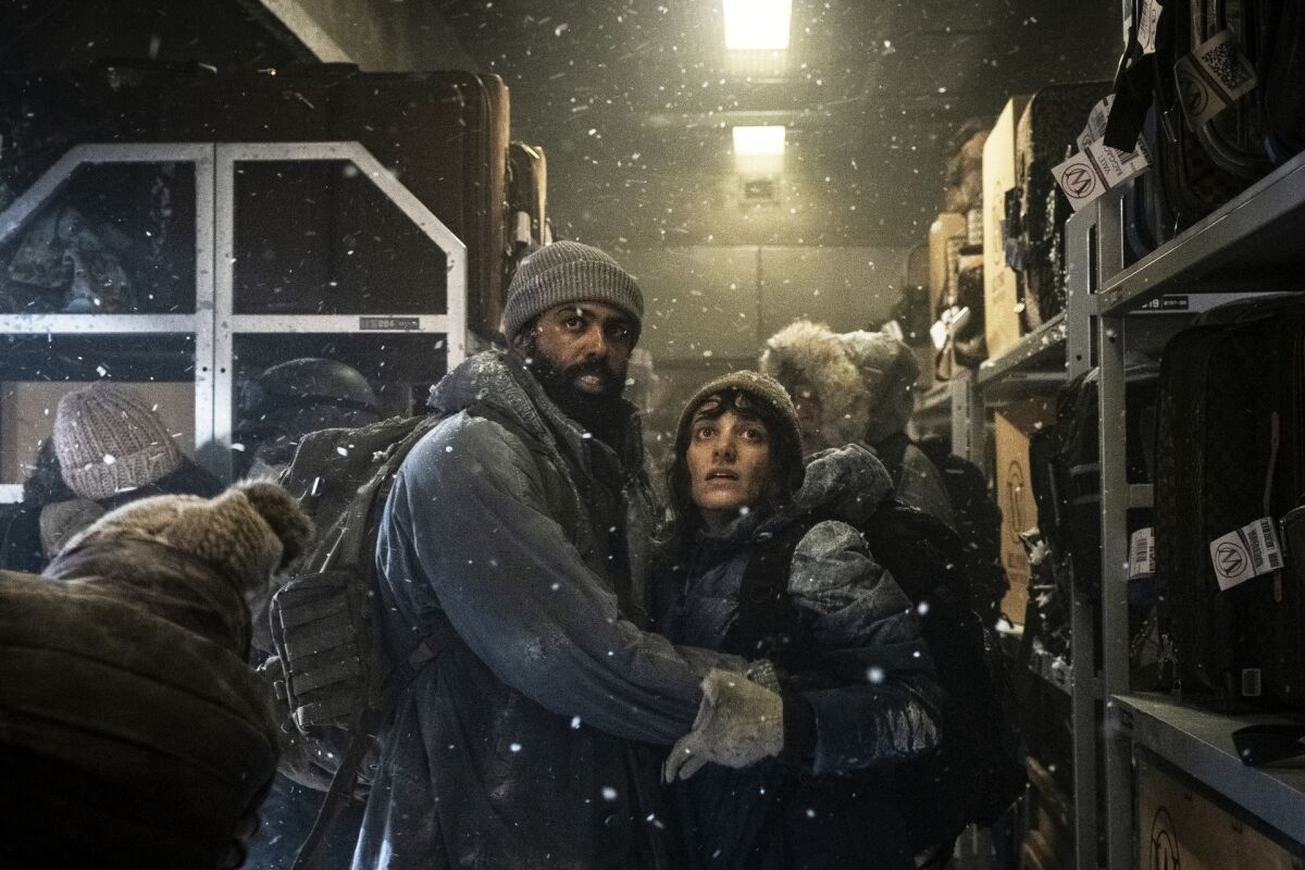 Daveed Diggs and Sheila Vand in "Snowpiercer"