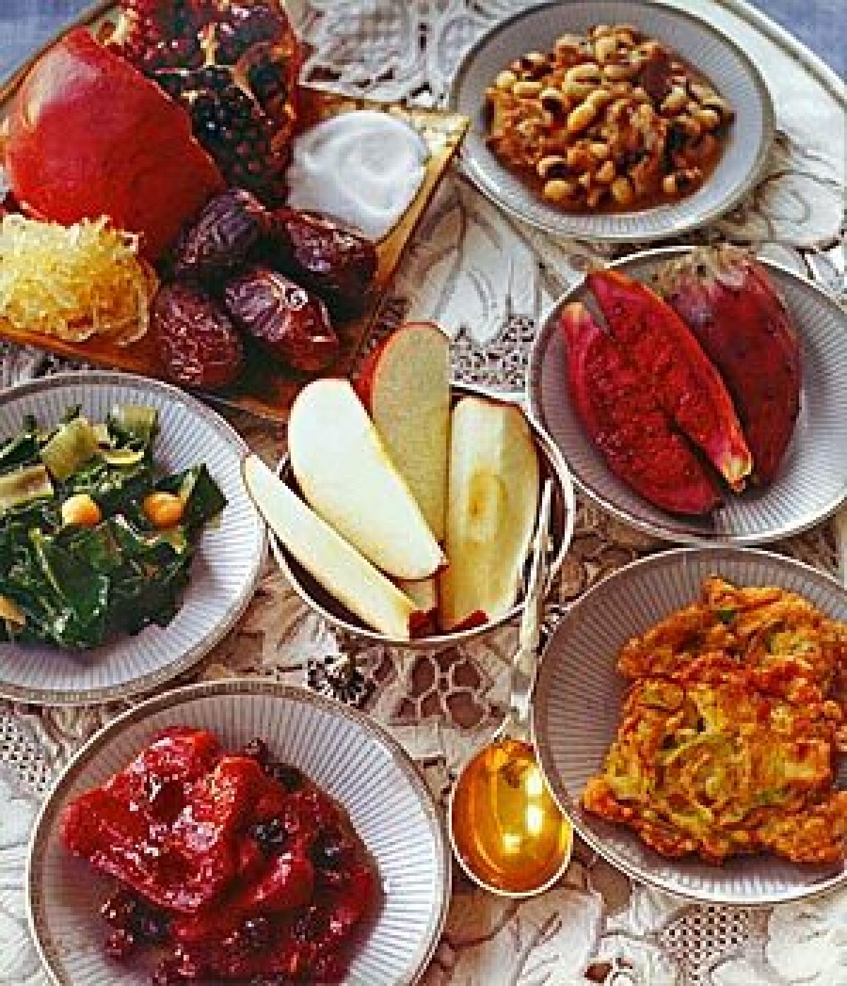 Leek fritters, lower right, are among the symbolic -- and delicious -- delights served on Rosh Hashanah.