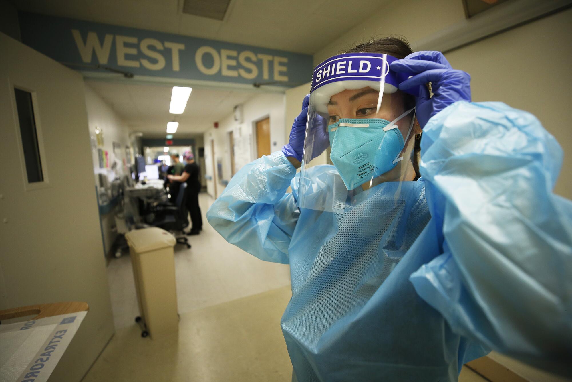 Dr. Christine Choi dons PPE