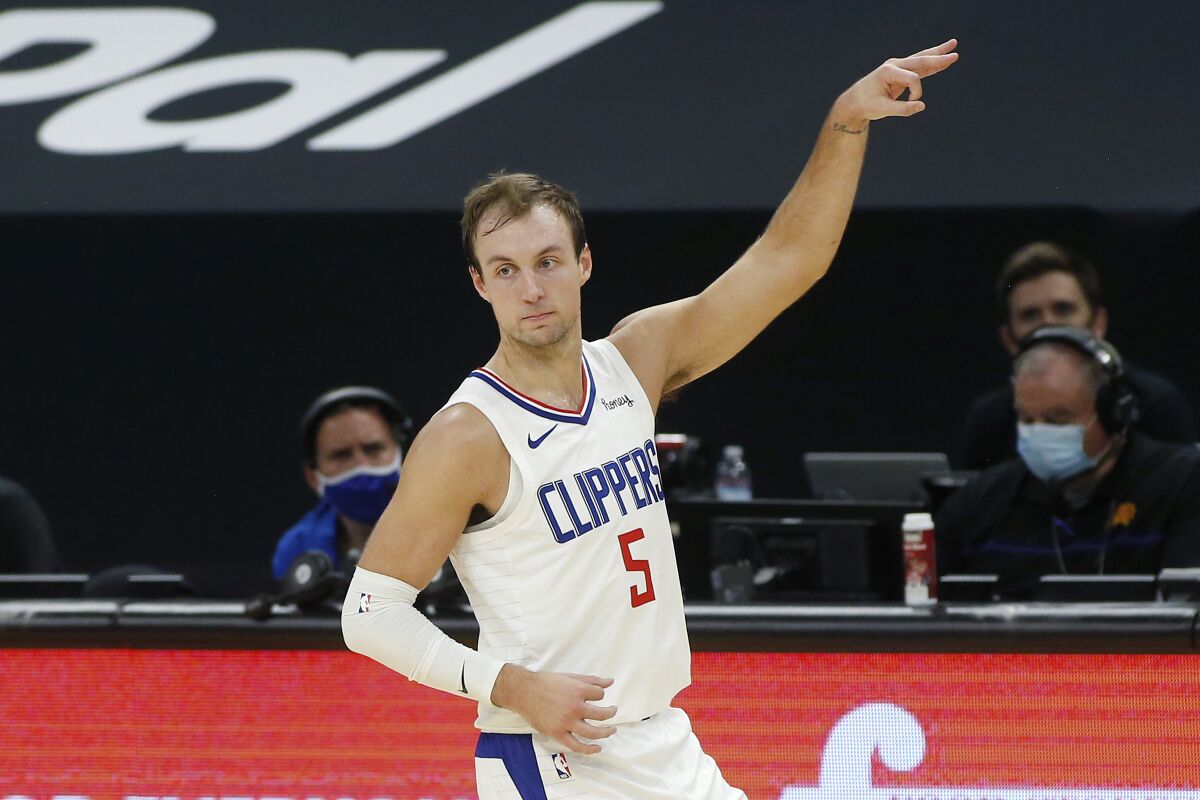 Luke Kennard gestures during a game for the Clippers.