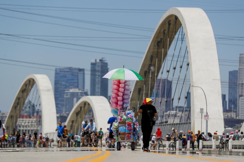 Los Angeles, CA, Sunday, July 10, 2022 - The Sixth Street Viaduct is open only to pedestrians and bicycles through 4 pm. It opens to traffic at 7 pm. (Robert Gauthier/Los Angeles Times)